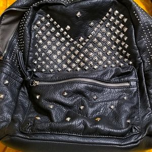 Leather studded backpack